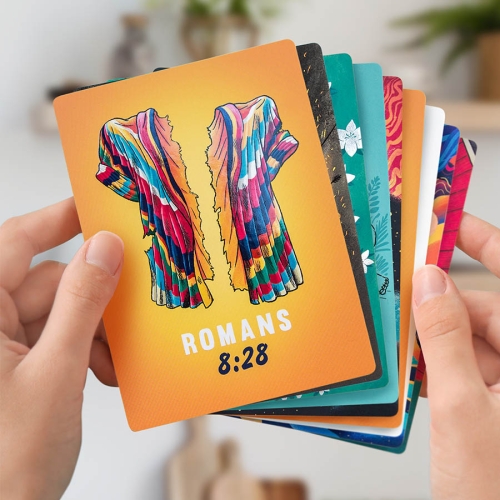 Illustrated Bible Cards held in a hand