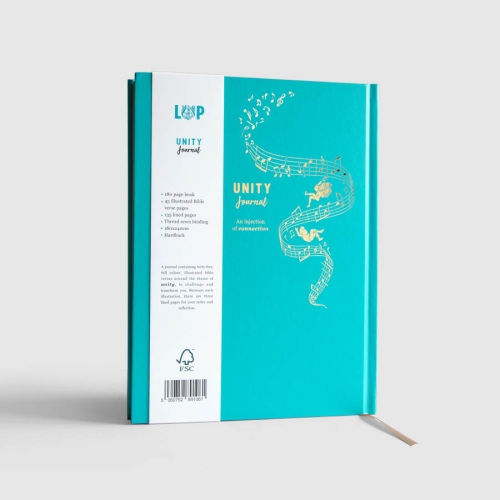 UNITY Journal inside showing an illustrated and a linned page for your own notes.  The journal is stood up open.  They make perfect gifts  for many occasions.