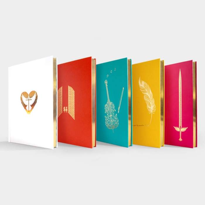 Showing all five of our Hardback large journals containing 45 illustrated Verse verses inside.  With gold gilt edges and gold iillustrations on the front and back covers